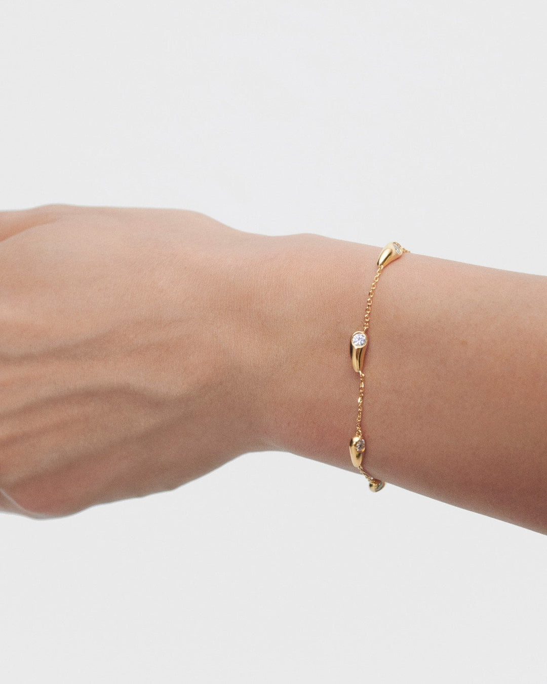 Elegant Becca Bracelet: White Zirconia, Adjustable Gold-Plated Sterling Silver Chain