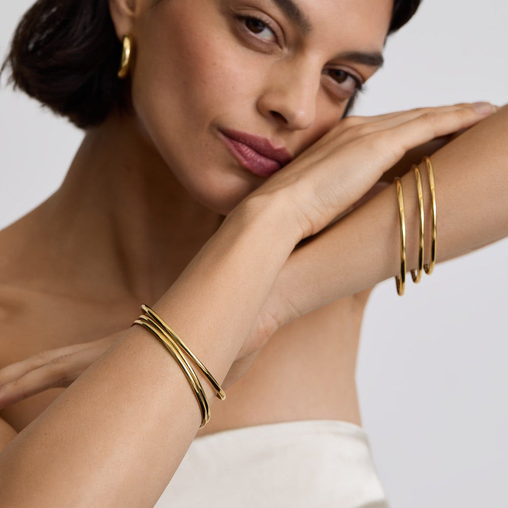 https://cdn.shopify.com/s/files/1/0481/1984/0936/files/Classic_gold_bangles_-_25_1.jpg?v=1771661592
