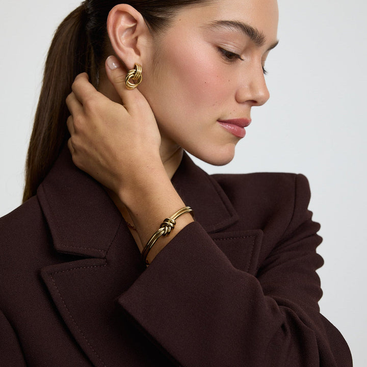 https://cdn.shopify.com/s/files/1/0481/1984/0936/files/KnotBangle1254.jpg?v=1760255739