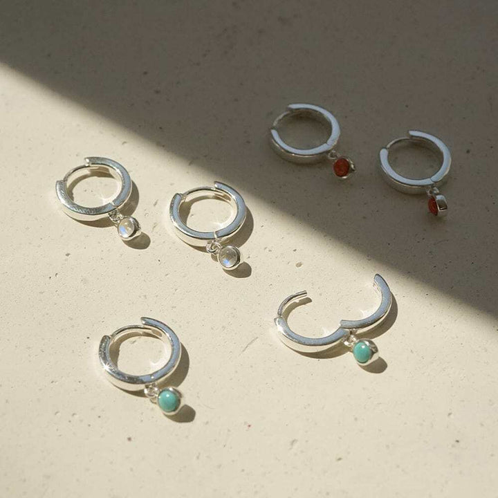 Daisy London Sterling Silver Healing Huggie Hoop Earrings Additional Image - 1