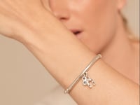 UNOde50 Silver Elastic Bracelet With Tube And Green Crystal
