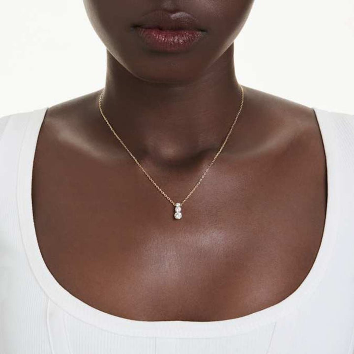 Swarovski Gold-Tone Plated Round Cut White Stilla Attract Pendant - MococoSwarovski57232989009657232988Necklaces
