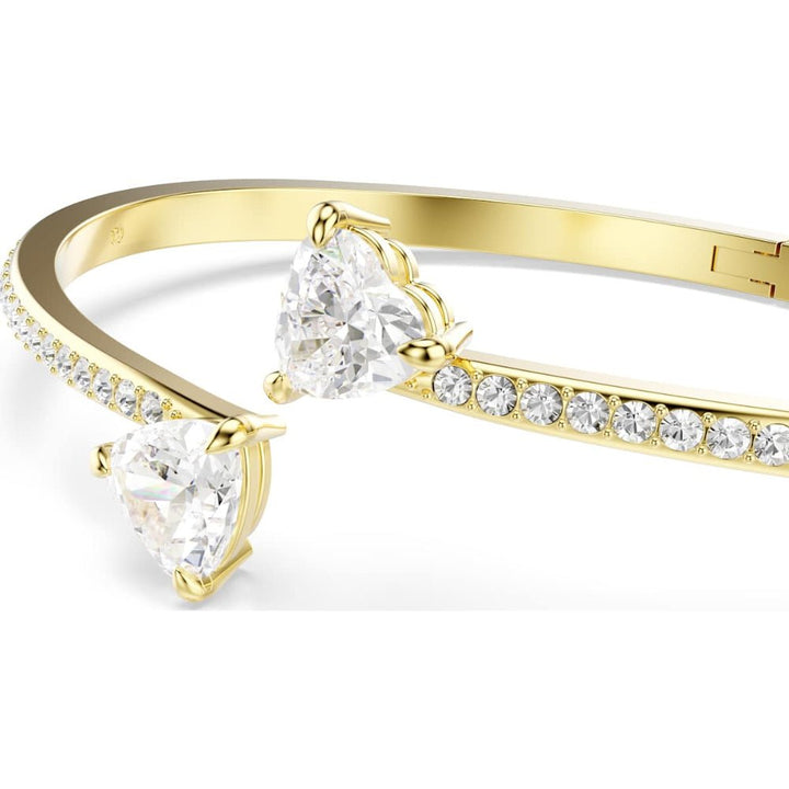 Swarovski Mesmera Gold - Tone Plated White Heart Attract Medium Bangle - MococoSwarovski57334749009657334743Bracelets