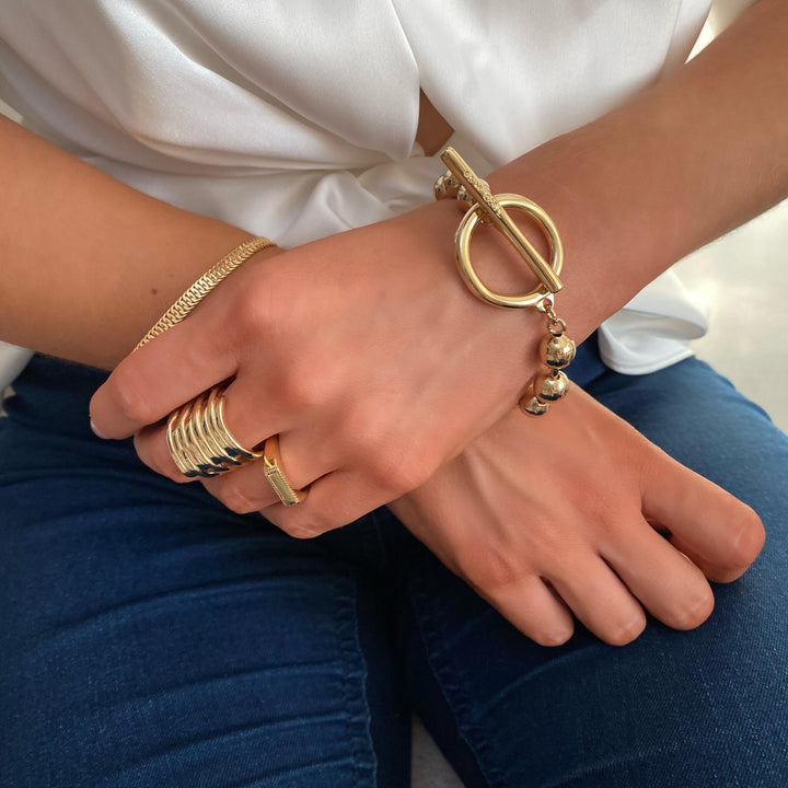 UnoDe50 Gold On / Off Bracelet