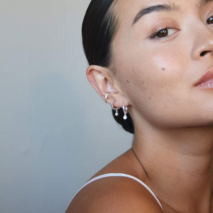 Daisy London Sterling Silver Howlite Healing Huggie Hoops - MococoDaisy LondonHE3006_SLV5056104108963Earrings